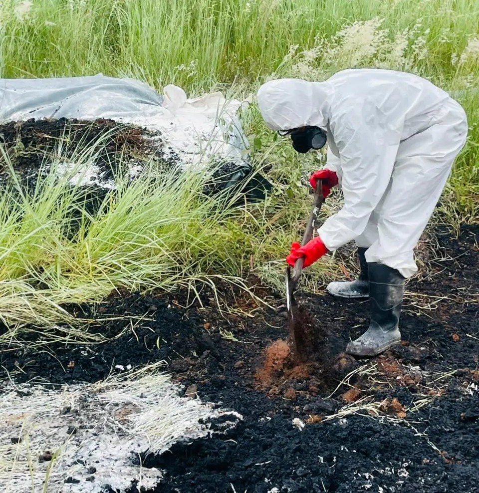 Environmental specialist conducting water testing in a river